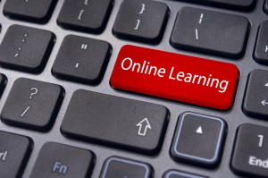 online learning concepts, with message on enter key of keyboard.